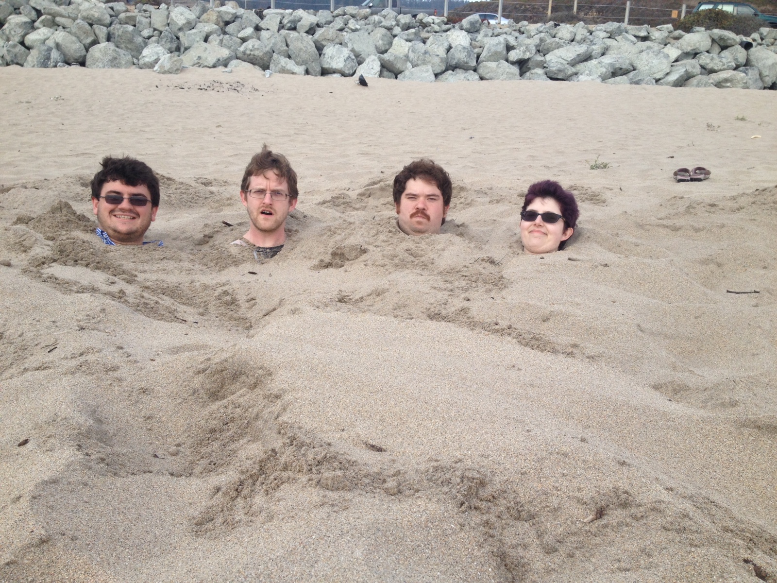 Item 66 - Four Heads at the Beach
